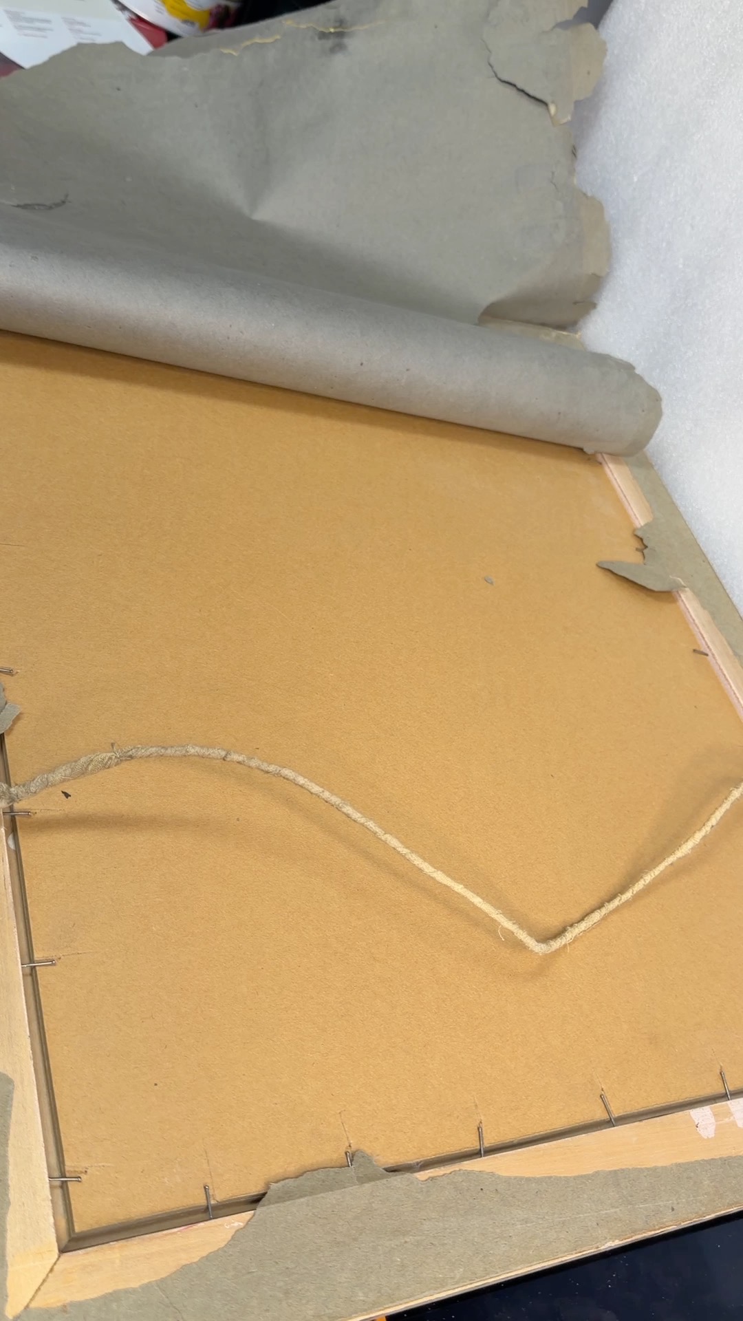 Aged paper backing and original fasteners